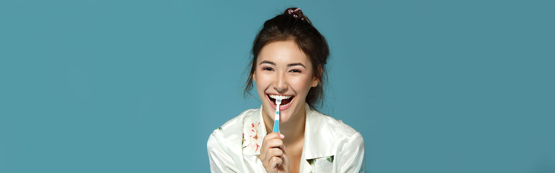 Smiling Lady Holding Tooth Brush in Hand